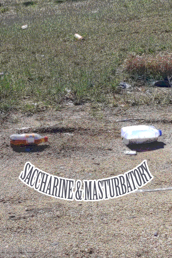 A piss bottle and a jug of milk on the side of the road.